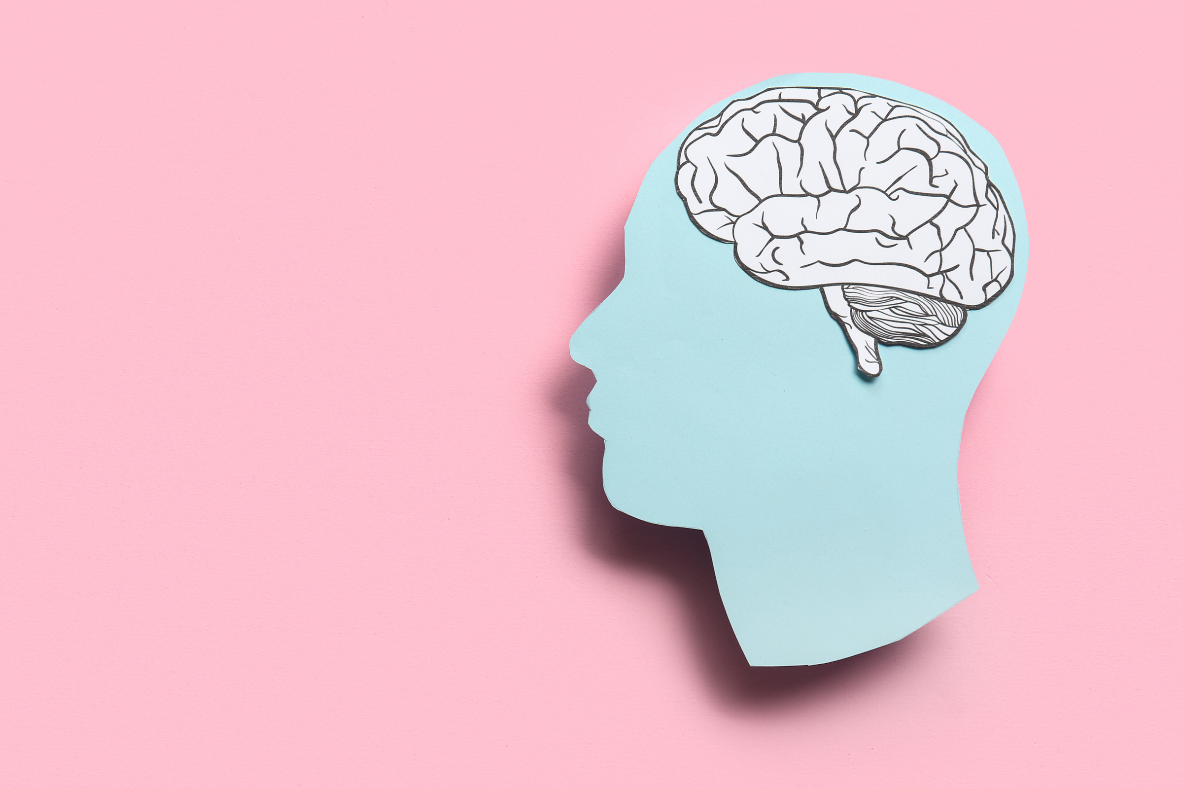 Graphic of a brain against a blue and purple background