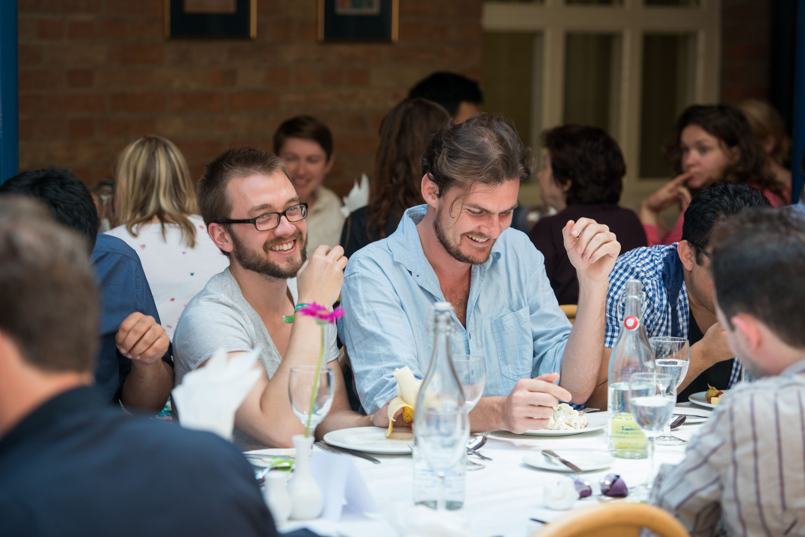 People eating and talking in the Rewley House Restaurant