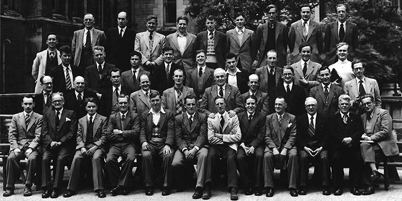 Black and white image of the North Staffordshire Miners at a summer meeting at Balliol College in 1954.